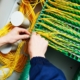 Worker installing fiber optic cabling