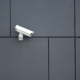 Security camera on office building, safety concept