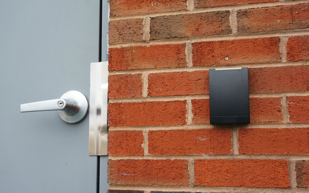 Access control pad on brick building