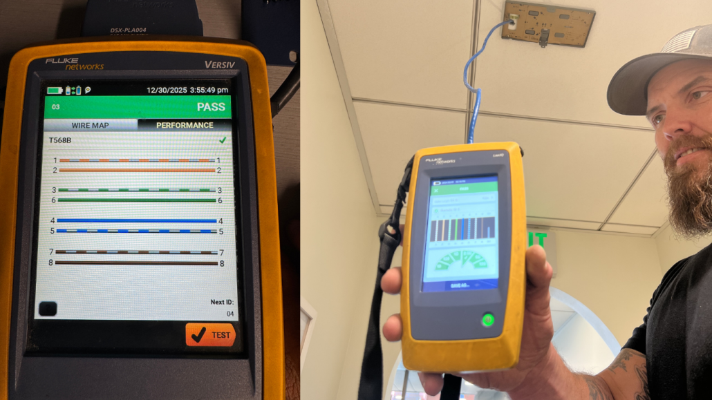 Close-up of a Fluke Networks DSX-5000 cable analyzer displaying a PASS result for T568B wire map and performance test, alongside a technician holding the tester connected to a wall data port for network cable certification.