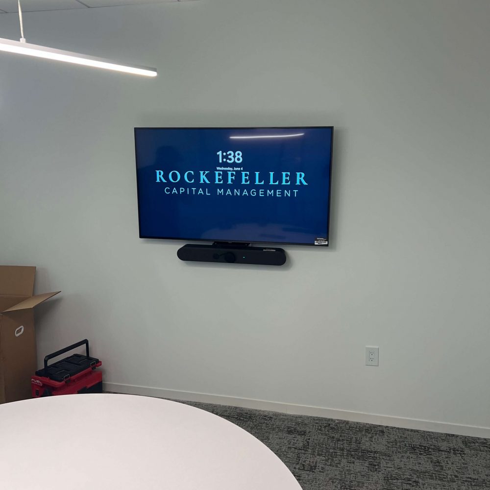 Signage on TV in conference room